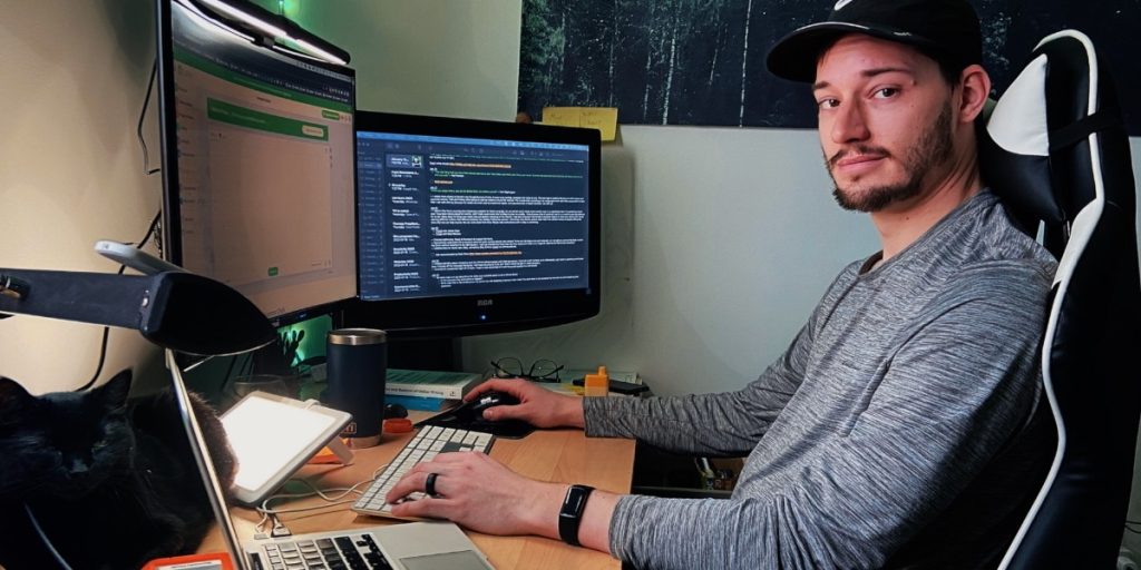 Scootydub writing in his office