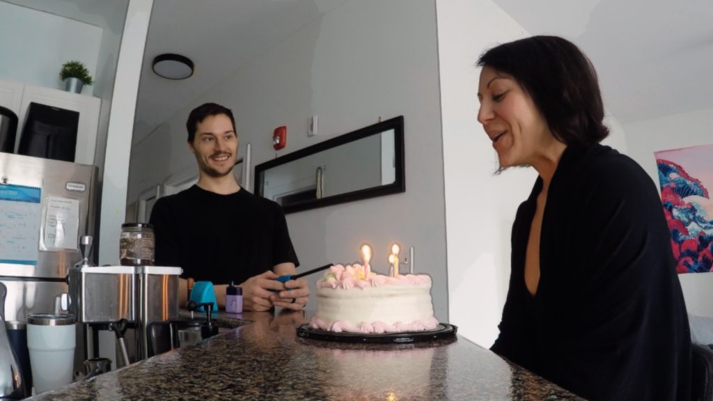 ScootyDub and Sarah blowing out candles on her birthday