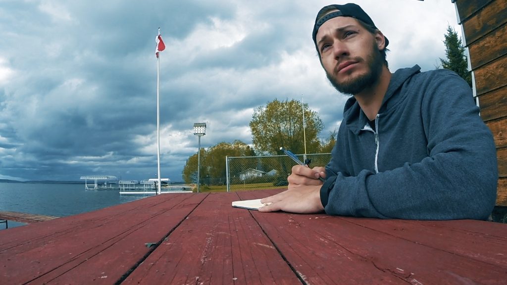 ScootyDub journaling at Wabamun Lake