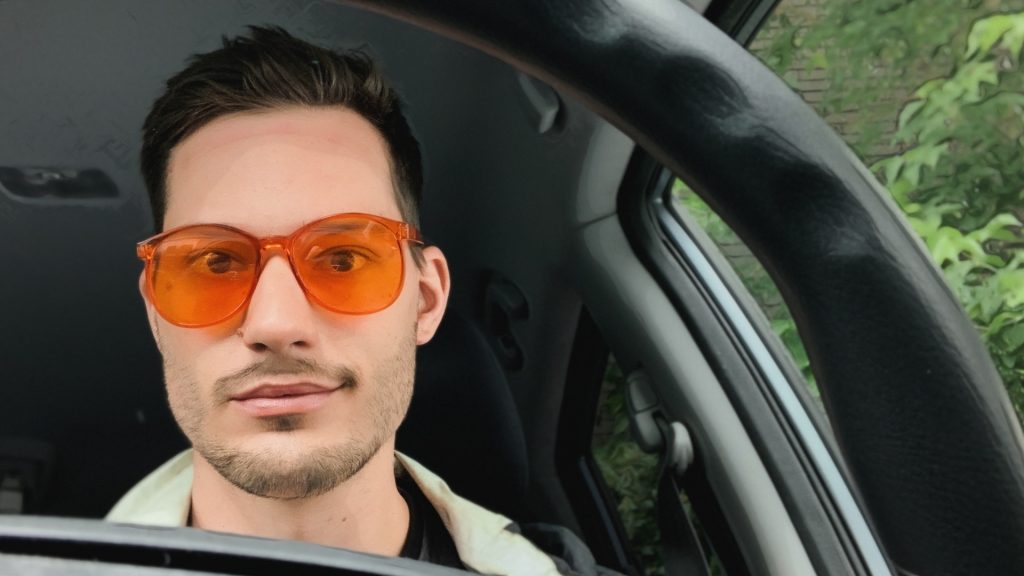 ScootyDub sitting in his CRV priming for the day with a video journal