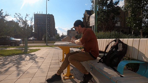 ScootyDub journaling at City Park, Calgary.