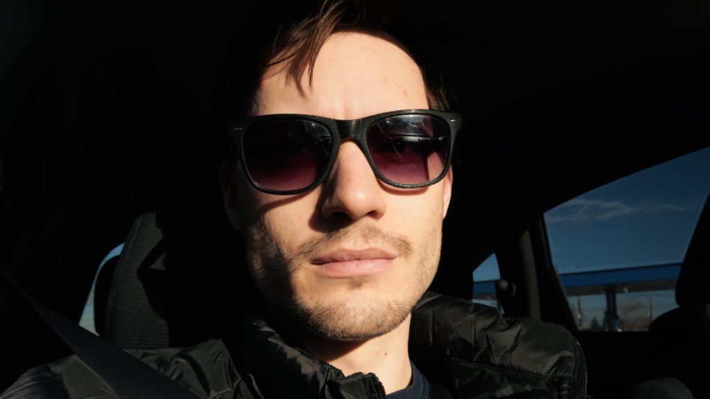 ScootyDub sunglasses selfie in the car